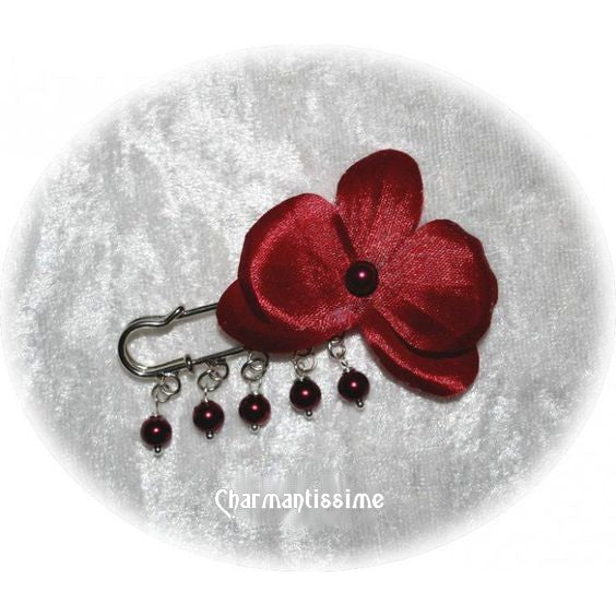 broche attache-traine mariage fleur orchidée bordeaux et perles bordeaux