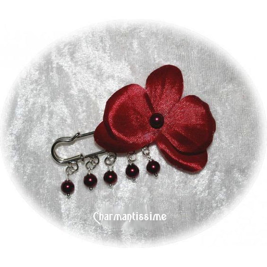 broche attache-traine mariage fleur orchidée bordeaux et perles bordeaux