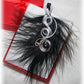 Bijou cadeau femme Collier pendentif Perle Hématite Spirales Plume noire tendance glamour art-déco