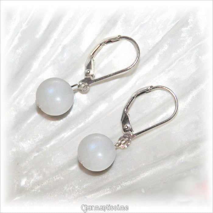 boucles d'oreilles argent 925 et pierre de lune blanche de style minimaliste