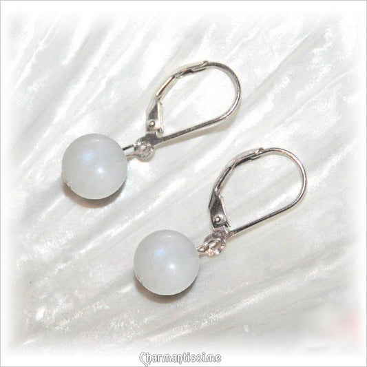 boucles d'oreilles argent 925 et pierre de lune blanche de style minimaliste