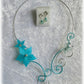 Parure mariage fleur turquoise et papillon : collier et boucles d'oreilles bleu turquoise et argent et strass cristal sur mesure