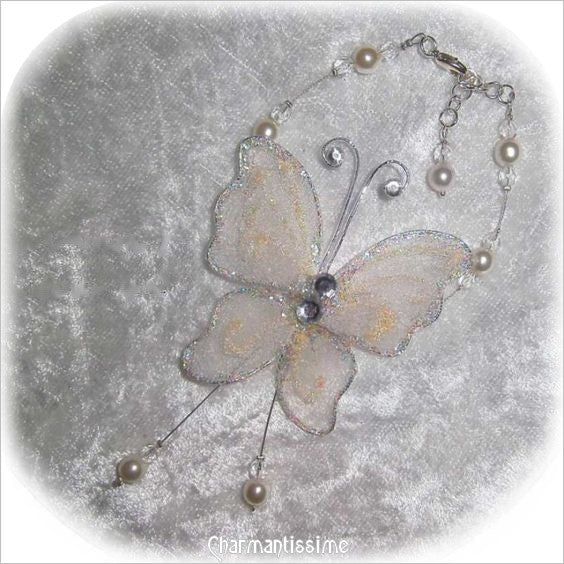 Bracelet papillon ivoire et perles pour mariage et fête