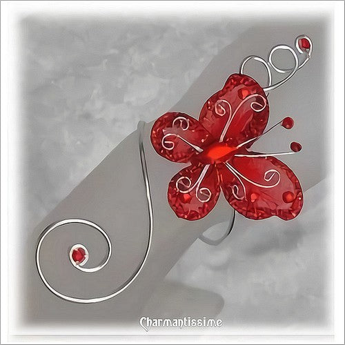 bracelet mariage papillon rouge ou fuchsia avec strass sur volutes d'alu pour mariage et fêtes