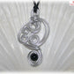 Collier pendentif perle tourmaline noire spirales métal alu argenté tendance art-déco